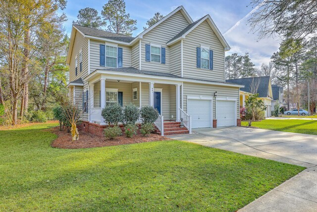 401 Waring St, Summerville, SC 29483 - traditional-style house with a front lawn, a porch, concrete driveway, and a garage