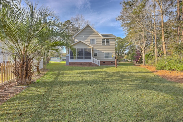 401 Waring St, Summerville, SC 29483 - back of property with crawl space, a lawn, fence, and a sunroom