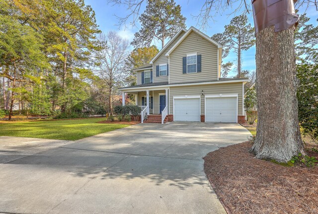 401 Waring St, Summerville, SC 29483 - traditional home with a porch, an attached garage, concrete driveway, and a front yard