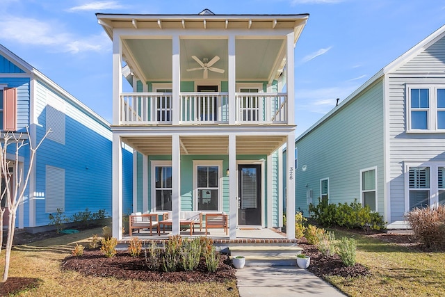 view of front of property with a porch and a ceiling fan