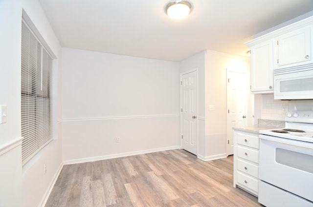 kitchen with light countertops, decorative backsplash, light wood-style floors, white cabinetry, and white appliances