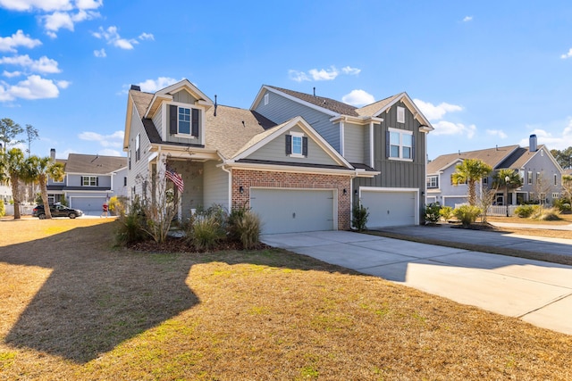 view of front of property with a front lawn and a garage