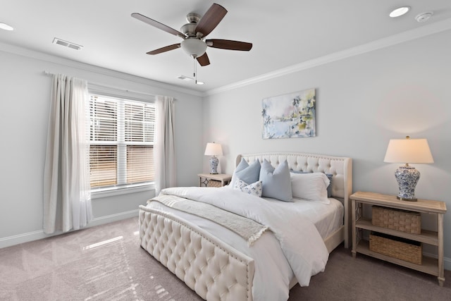 bedroom featuring ceiling fan, ornamental molding, and carpet floors