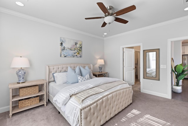 bedroom featuring ceiling fan, carpet floors, and crown molding