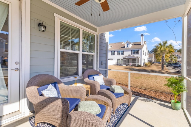 view of patio / terrace with ceiling fan and a porch