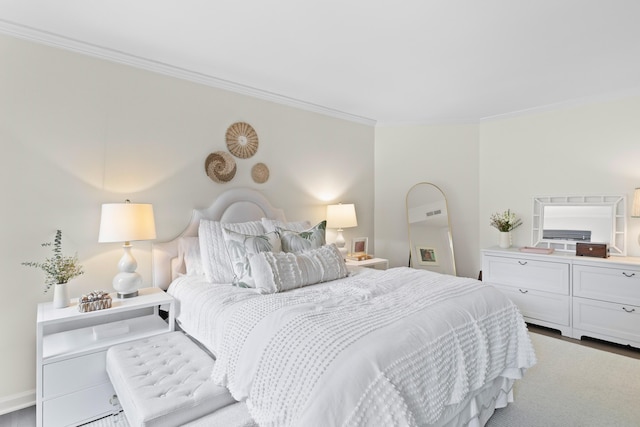 bedroom featuring crown molding