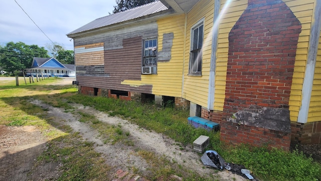 view of side of property featuring cooling unit
