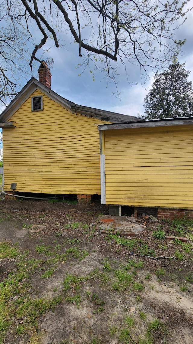 exterior space with a chimney