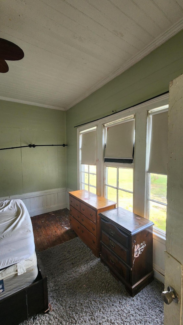 bathroom with hardwood / wood-style floors, crown molding, and ceiling fan