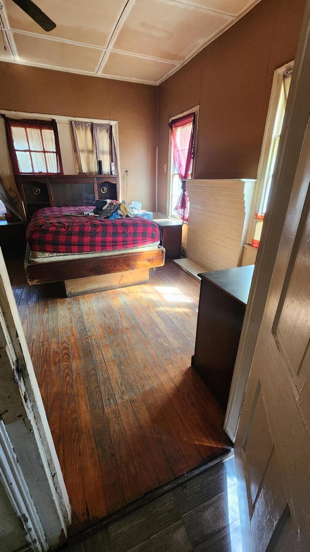 bedroom featuring wood-type flooring
