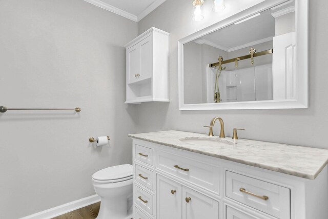 598 Maple Branch Rd, Reevesville, SC 29471 - bathroom featuring ornamental molding, vanity, a shower, and wood finished floors