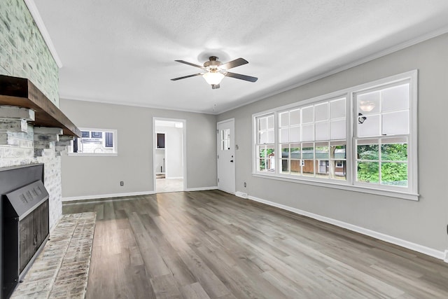 598 Maple Branch Rd, Reevesville, SC 29471 - unfurnished living room with ceiling fan, wood finished floors, a textured ceiling, and heating unit