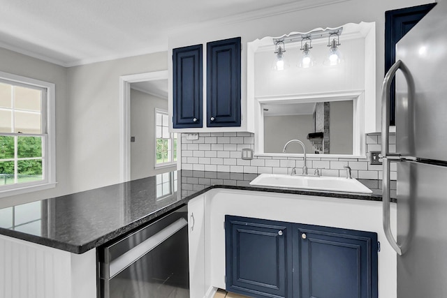 598 Maple Branch Rd, Reevesville, SC 29471 - kitchen featuring appliances with stainless steel finishes, blue cabinetry, and plenty of natural light