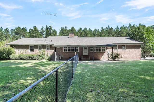 598 Maple Branch Rd, Reevesville, SC 29471 - ranch-style home with entry steps, a fenced backyard, a chimney, and brick siding