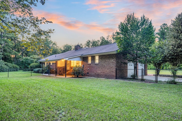 598 Maple Branch Rd, Reevesville, SC 29471 - rear view of property with brick siding, a fenced backyard, a chimney, and crawl space