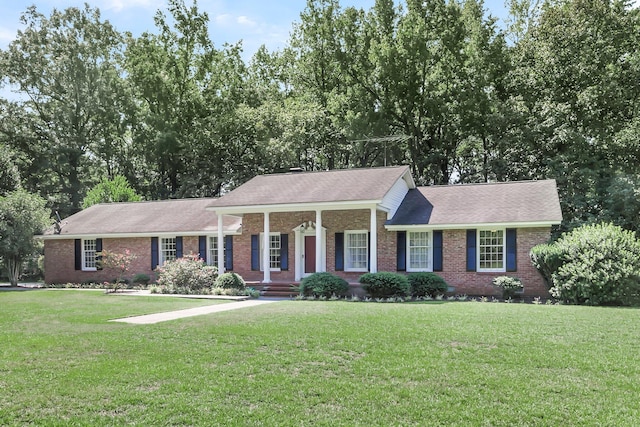 598 Maple Branch Rd, Reevesville, SC 29471 - view of front facade with brick siding, a front yard, and roof with shingles