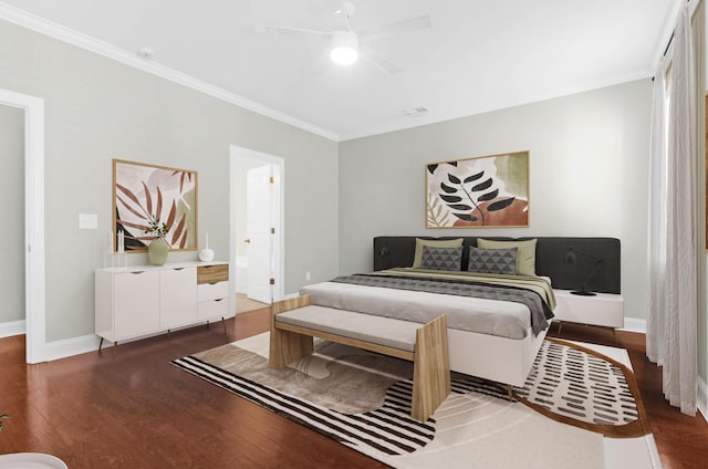 bedroom featuring crown molding, baseboards, a ceiling fan, and wood finished floors