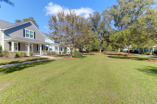view of yard with a porch