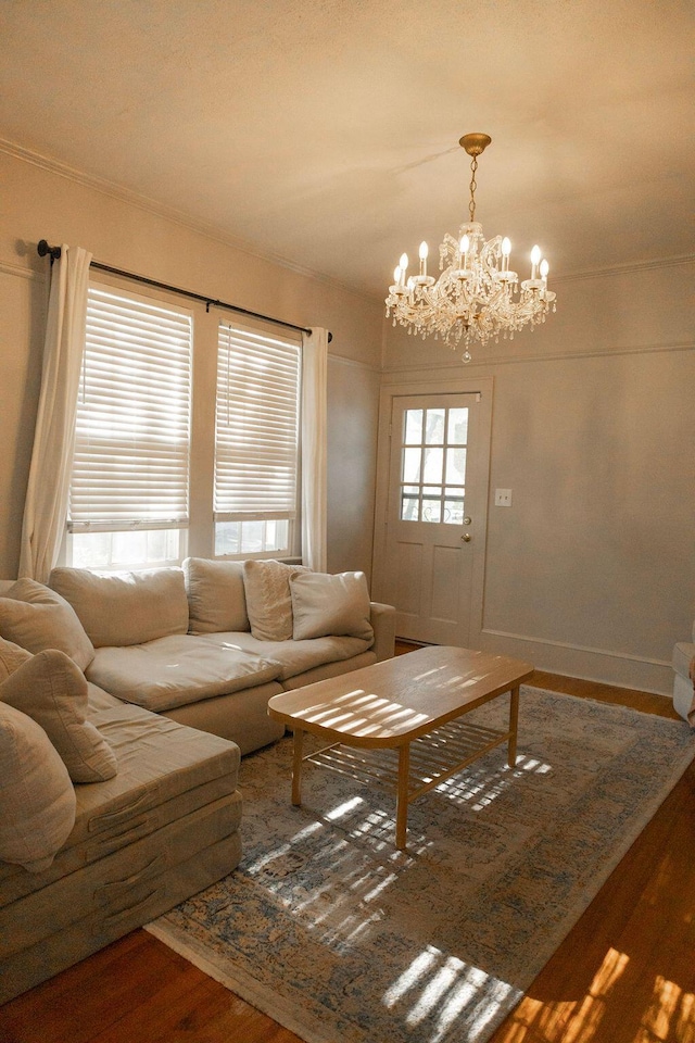 203 Weiters St, Walterboro, SC 29488 - living room with a chandelier, wood finished floors, and ornamental molding
