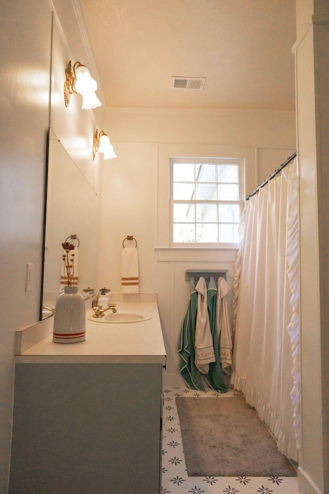 203 Weiters St, Walterboro, SC 29488 - full bathroom with vanity, ornamental molding, and curtained shower
