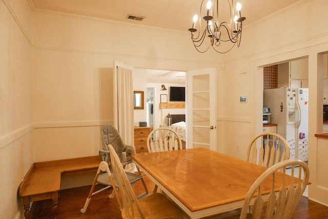 203 Weiters St, Walterboro, SC 29488 - dining room featuring a chandelier, crown molding, and wood finished floors