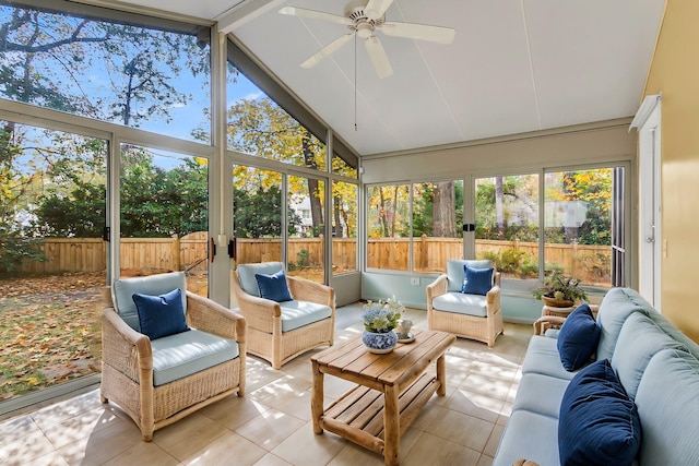 sunroom featuring ceiling fan and vaulted ceiling