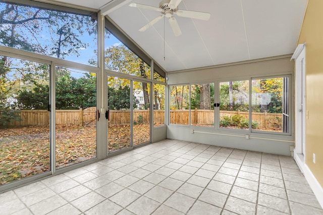 unfurnished sunroom featuring ceiling fan and lofted ceiling