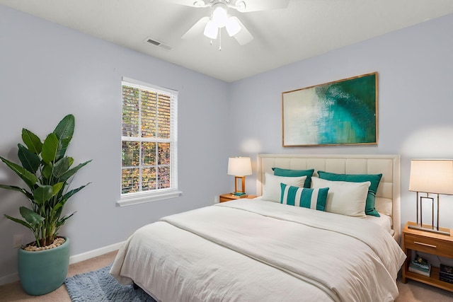 carpeted bedroom featuring ceiling fan