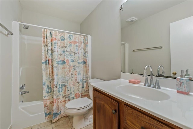 full bathroom featuring tile patterned flooring, shower / bath combination with curtain, vanity, and toilet