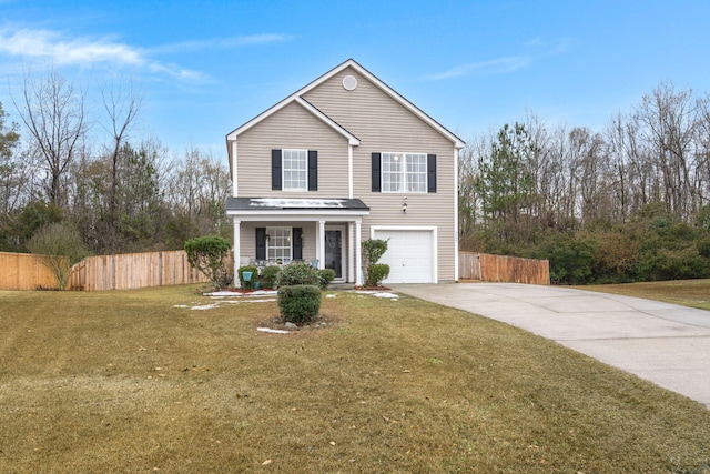 front facade featuring a garage, a front yard, and covered porch