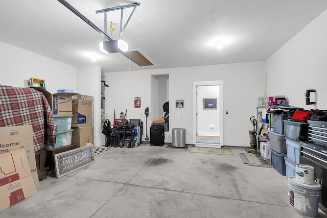 garage featuring a garage door opener