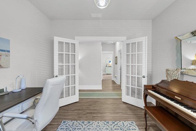 office area featuring hardwood / wood-style flooring and french doors