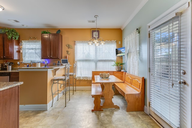 404 Norwood Ct, Moncks Corner, SC 29461 - dining area featuring a chandelier and crown molding