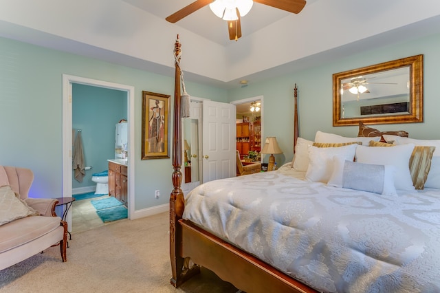 404 Norwood Ct, Moncks Corner, SC 29461 - bedroom with light carpet, ensuite bath, and a ceiling fan