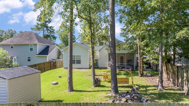 404 Norwood Ct, Moncks Corner, SC 29461 - rear view of house with a fenced backyard and a sunroom