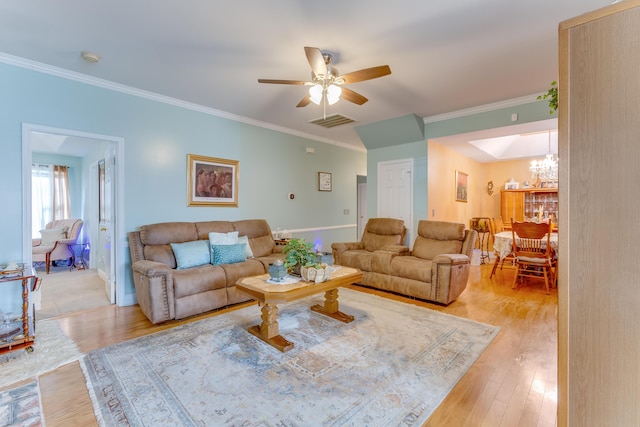 404 Norwood Ct, Moncks Corner, SC 29461 - living room with a chandelier, crown molding, a ceiling fan, and light wood finished floors