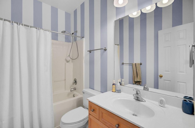 bathroom featuring wallpapered walls, shower / bathtub combination with curtain, toilet, and vanity