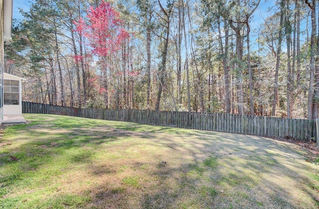 view of yard featuring a fenced backyard