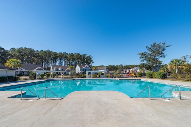 pool featuring a patio area