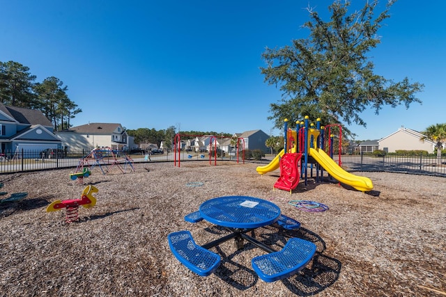 community jungle gym with fence