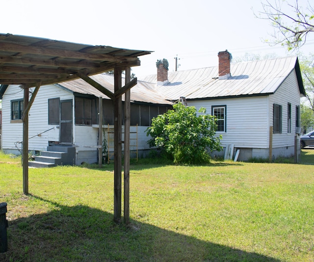 view of yard featuring entry steps