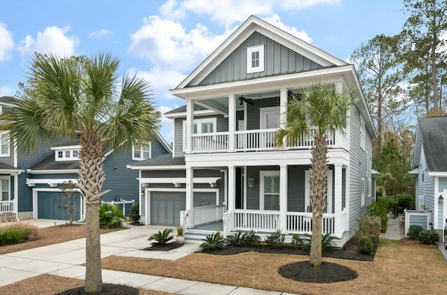 beach home with a garage, a balcony, and a porch