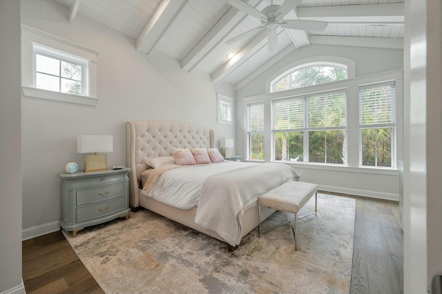 bedroom with lofted ceiling with beams, hardwood / wood-style floors, and ceiling fan