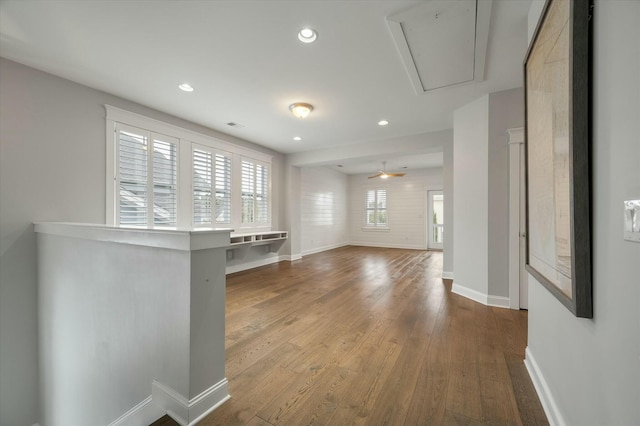 interior space with hardwood / wood-style flooring and ceiling fan