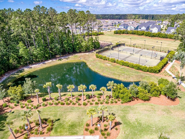 drone / aerial view with a water view