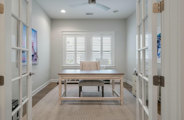 office space with french doors, ceiling fan, and wood-type flooring