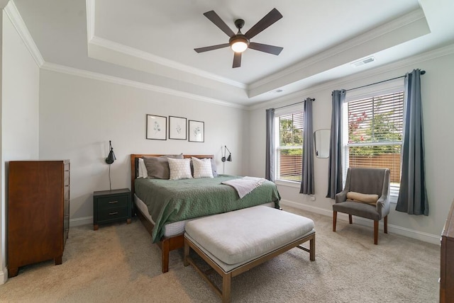 1250 Hammrick Ln, Johns Island, SC 29455 - bedroom with a tray ceiling, ornamental molding, light carpet, and a ceiling fan