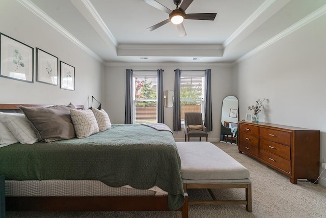 1250 Hammrick Ln, Johns Island, SC 29455 - bedroom featuring a tray ceiling, light carpet, crown molding, and a ceiling fan
