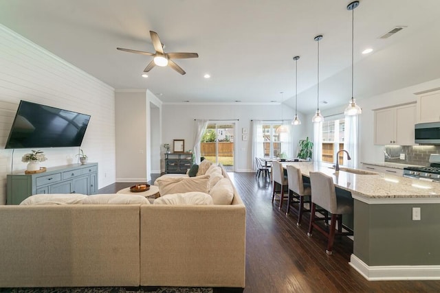 1250 Hammrick Ln, Johns Island, SC 29455 - living area with a ceiling fan, dark wood finished floors, recessed lighting, and ornamental molding