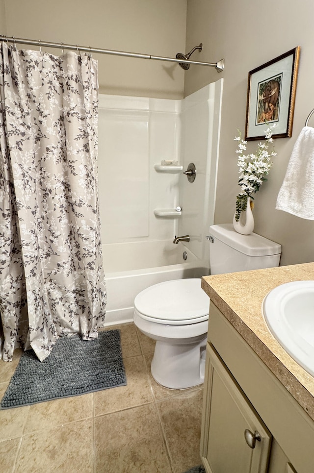 bathroom with shower / tub combo, vanity, toilet, and tile patterned floors